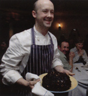 Chef, Mark Rowlandson parades the puddings